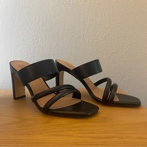 Call it spring- black, heeled strap sandal
